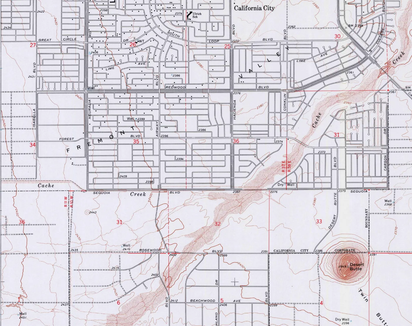 Part of a 1973 USGS topographic map: a dense rectangular street grid labelled Fremont Valley and California City, with streets named Redwood, Sequoia, Forest and Neuralia, only a scattering of small black squares for buildings, and more mapped streets running south past Desert Butte and the Twin Buttes.